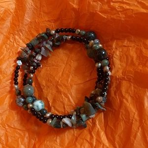 Necklace on stiff wire with beads and stones